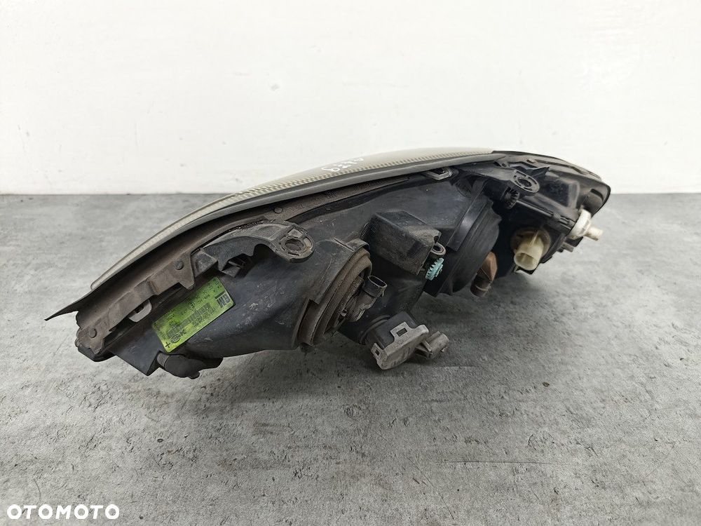 LAMPA PRZÓD PRAWA OPEL ASTRA G 093175724  1EG007640-58 - 4