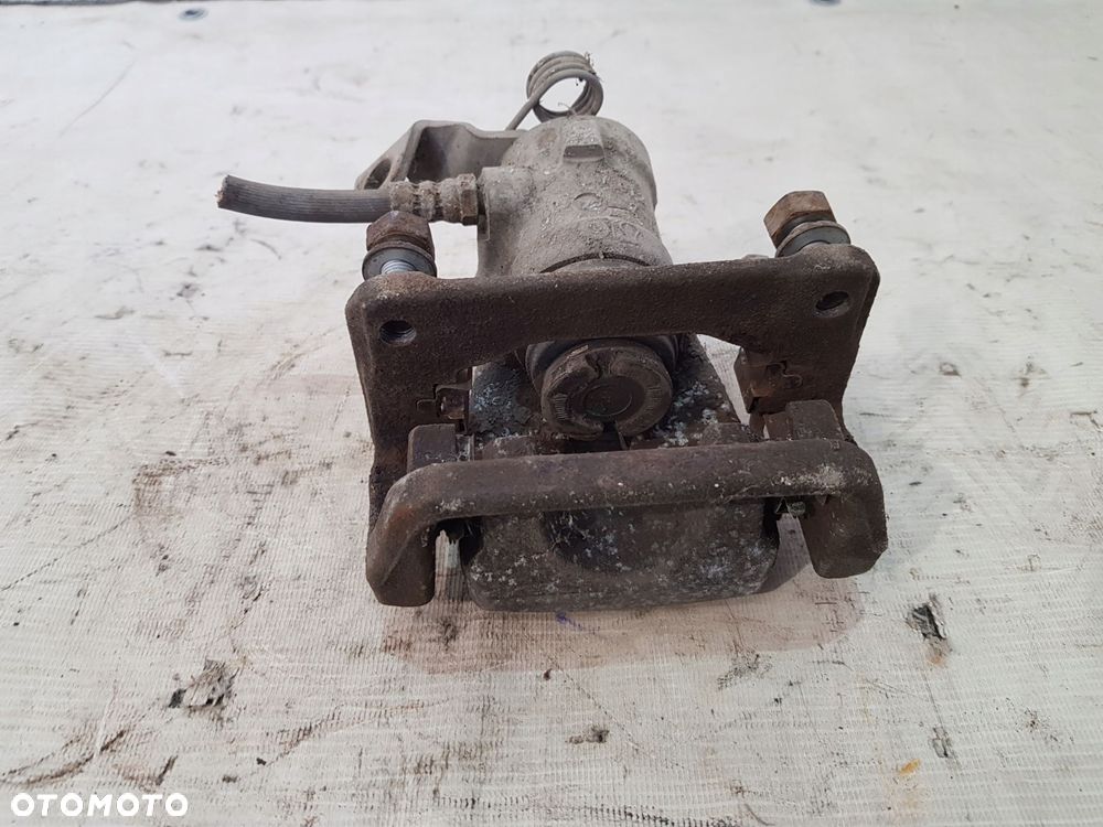 zacisk hamulcowy prawy tył fiat 500l 1.3d 12r- - 7