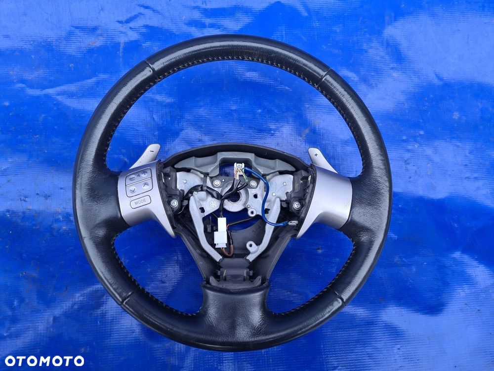 Toyota AURIS I 07-09 kierownica skóra łopatki - 1
