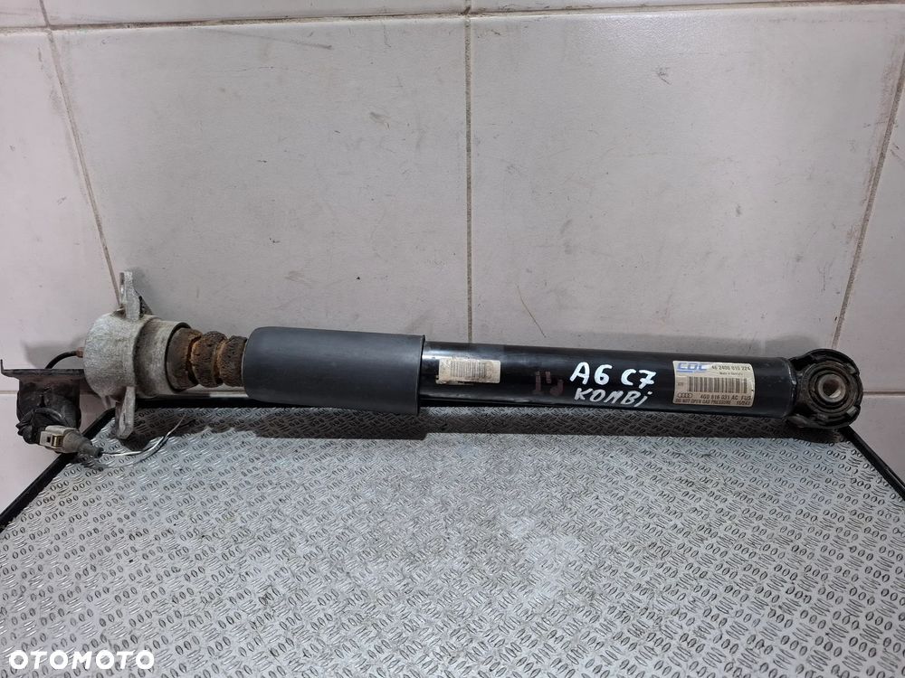 Amortyzator aktywny tył Audi A6 C7 kombi 2,0 TDI 190KM 2015 rok nr 4G0616031AC - 1