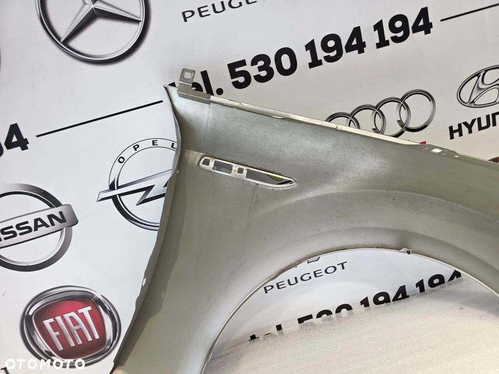 FORD MONDEO MK4 , LIFT 07-14 LEWY BŁOTNIK PRZEDNI PRZÓD NR AUKCJI BŁ249 - 25