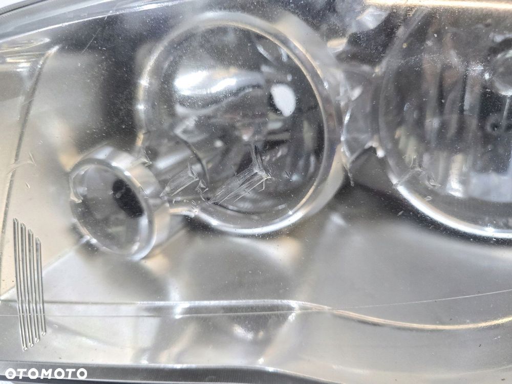 reflektor lampa przód lewy chrysler voyager town country usa 05113337ae - 4
