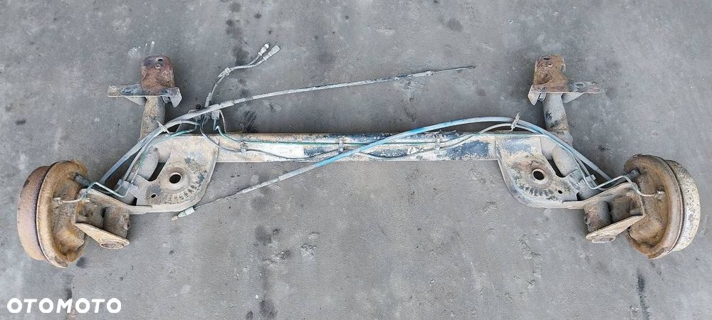 BELKA OŚ ZAWIESZENIA TYŁ BĘBNY Z ABS RENAULT CLIO II - 1