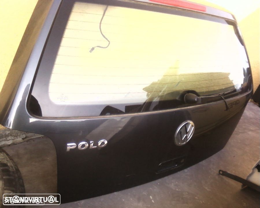 tampa da mala Vw Polo 1999-2001 - 1