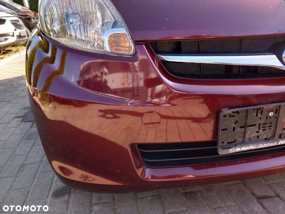 SUBARU JUSTY ZDERZAK PRZEDNI PRZÓD KOLOR: R56 - 5