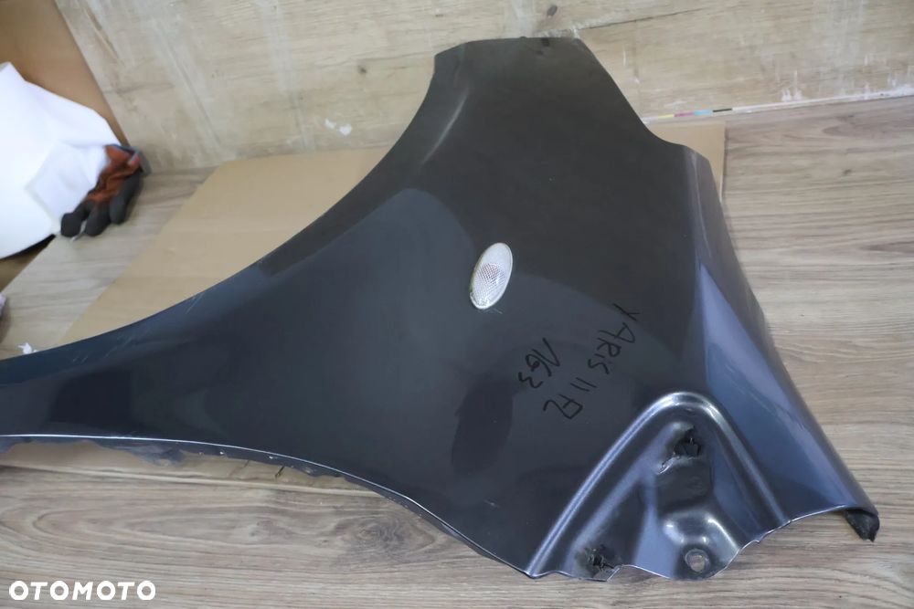 TOYOTA YARIS II 2 LIFT 09-11 BŁOTNIK LEWY PRZÓD PRZEDNI 1G3 - 6