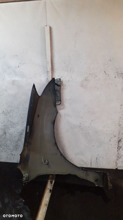 * TOYOTA COROLLA E12  BŁOTNIK PRZÓD LEWY 1G3 - 4