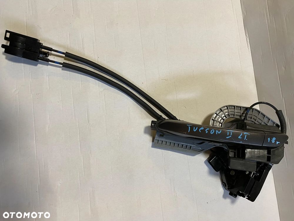 Klamka zewnętrzna drzwi Hyundai Tucson III lift lewy tył XN3 OE