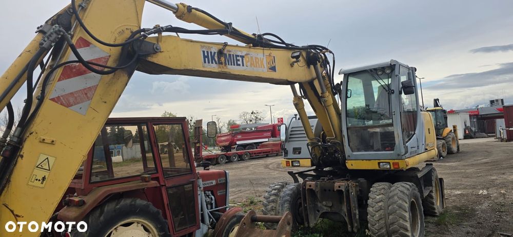 New Holland MH Plus - 2
