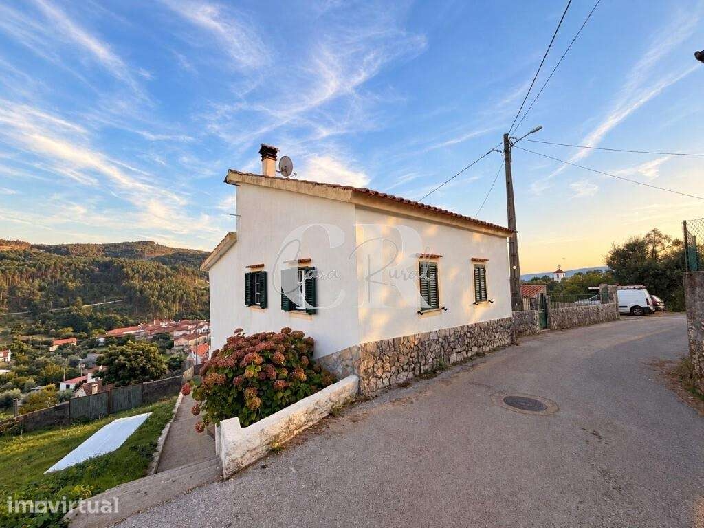Moradia em pedra com 4 quartos, logradouro e terreno agrícola - Grande imagem: 2/27