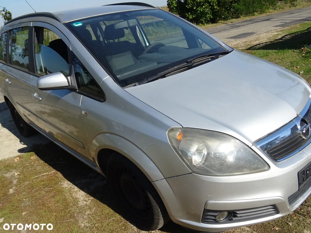 BŁOTNIK PRAWY PRZÓD PRZEDNI ŚLIZG OPEL ZAFIRA B Z157 2AU SREBRNY - 1