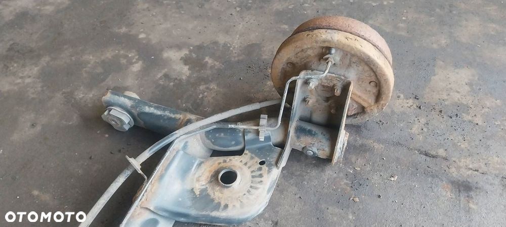 BELKA OŚ ZAWIESZENIA TYŁ BĘBNY BEZ ABS RENAULT THALIA I - 5