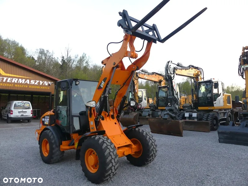 Caterpillar CAT 906H / Z Niemiec / 6424mtg / - 40