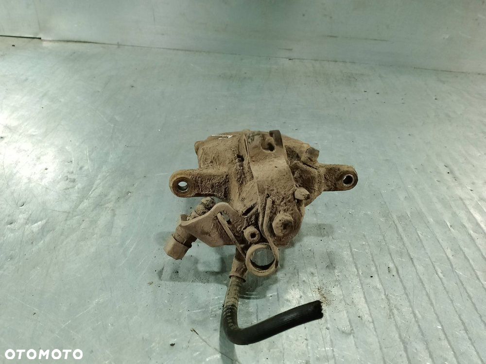 ZACISK HAMULCOWY PRAWY TYŁ OPEL VIVARO I 1.9 DCI - 2