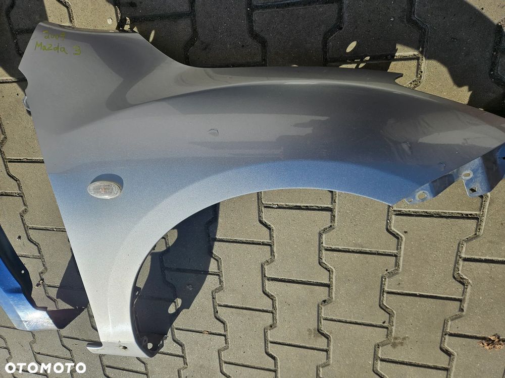 Mazda III 3 BL  błotnik prawa przód przedni