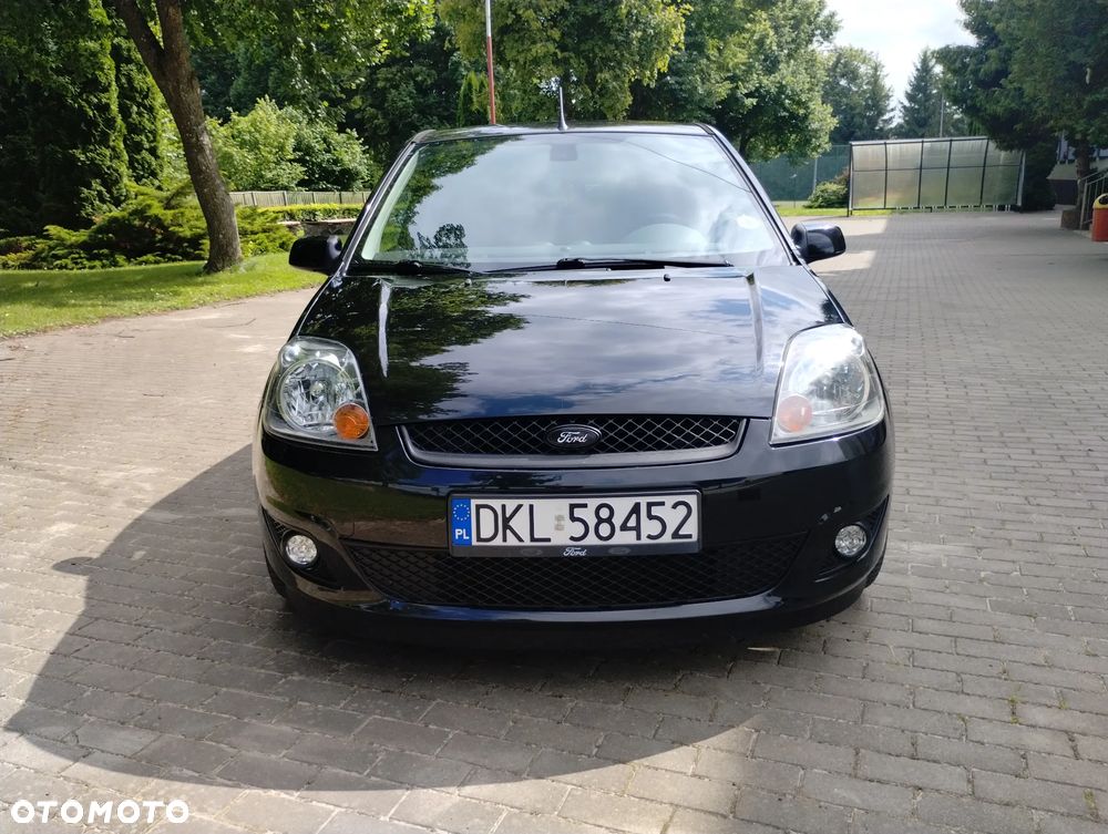 Ford Fiesta 1.4 Ghia - 22