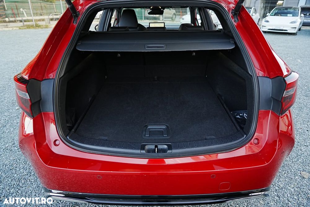 Toyota Corolla TS 1.8 HSD Exclusive - 15