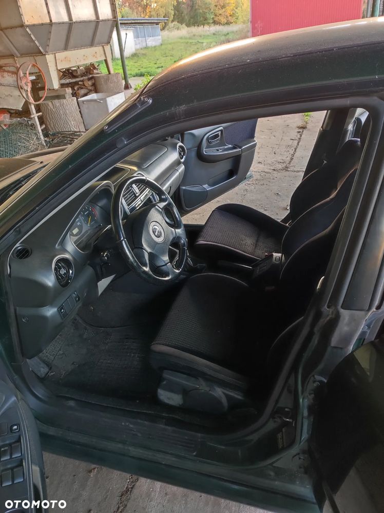 Subaru Impreza 1.6i 4x4 - 25