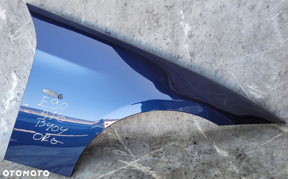 BŁOTNIK PRAWY PRZÓD PRZEDNI BMW E90 E91 A76 TIEFSEBLAU ORG LAKIER B404
