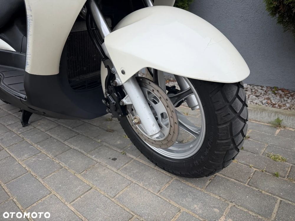 Suzuki Burgman - 11