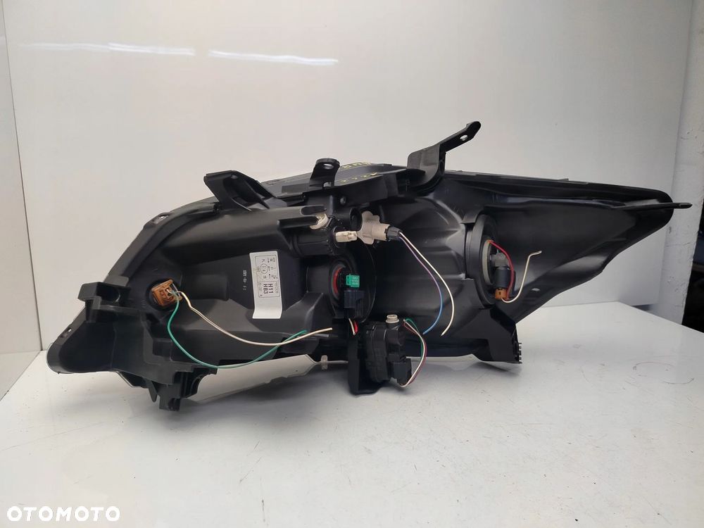 TOYOTA AURIS I LIFT 09R- REFLEKTOR LAMPA PRAWY PRZÓD PRAWA PRZEDNIA - 9