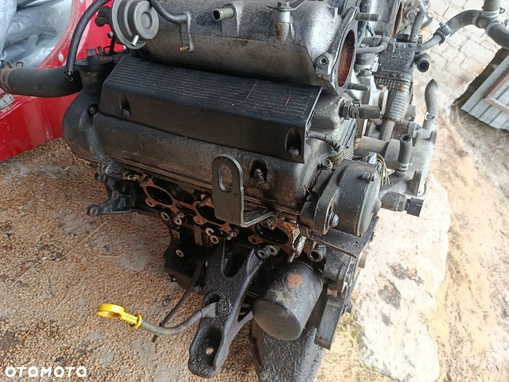 Silnik słupek Suzuki grand Vitara 1 2.7 v6 xl7 - 4