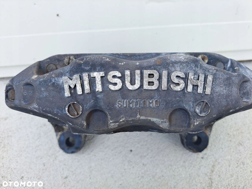 ZACISK LEWY PRZÓD PRZEDNI MITSUBISHI GTO 3000GT VR - 2