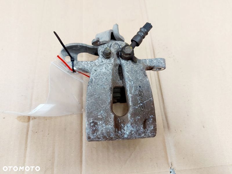 KIA CEED II 2 1.6 CRDI ZACISK HAMULCOWY LEWY TYŁ - 1