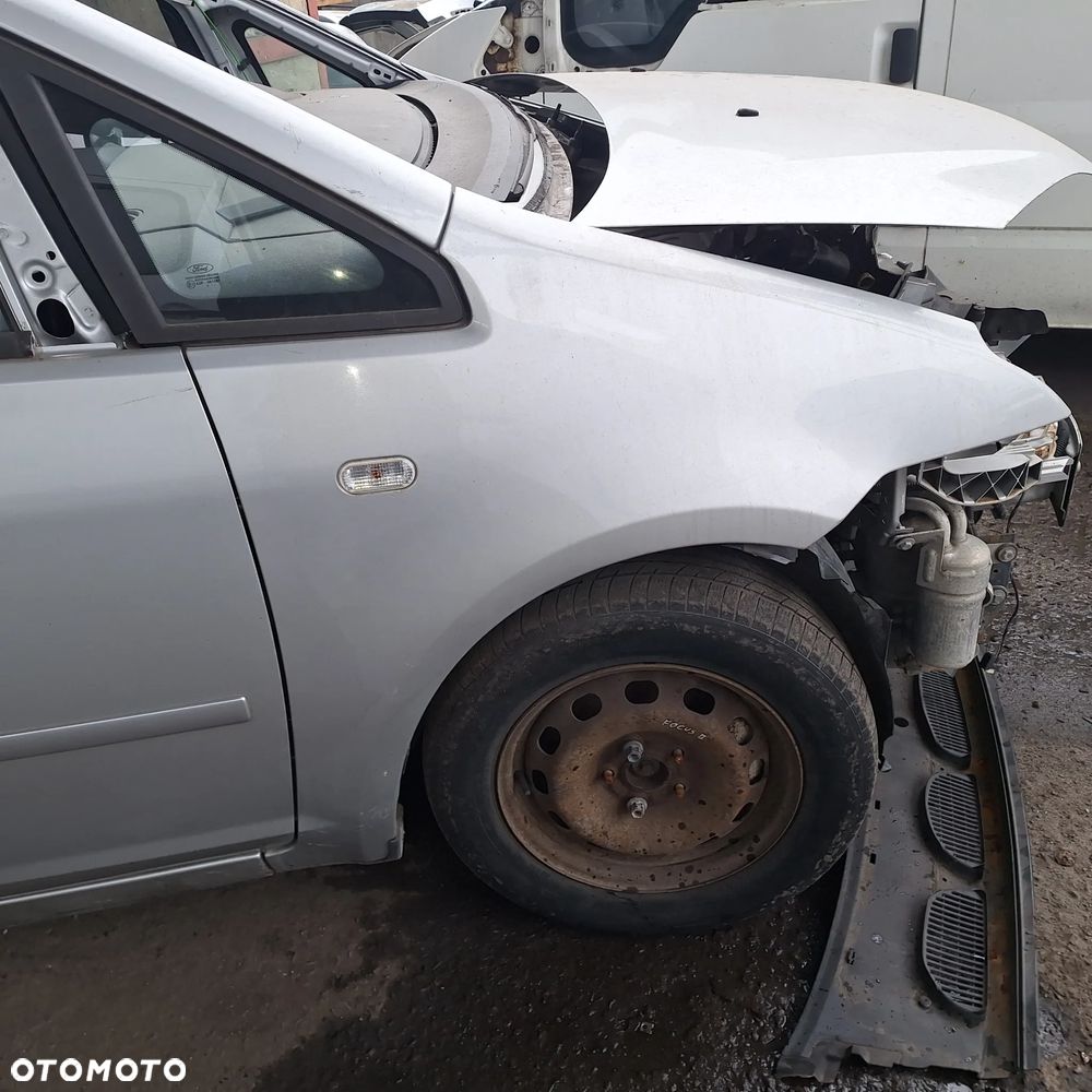 BLOTNIK PRAWY PRZOD FORD C-MAX 03 BEZ MALOWANIA - 1