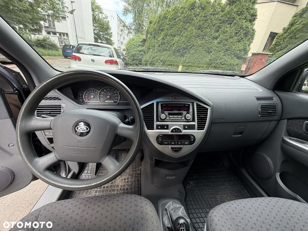 Kia Carens 2.0 EX - 13