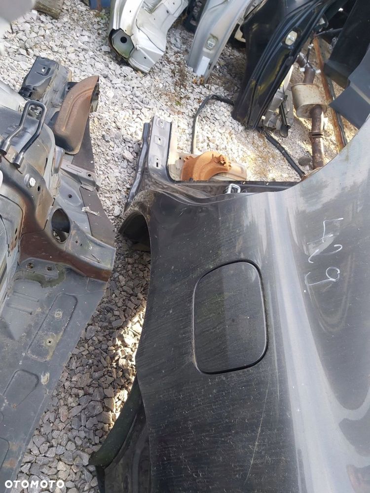 TOYOTA Avensis T25 LIFT błotnik tył lewy ćwiartka lewa HB - 2