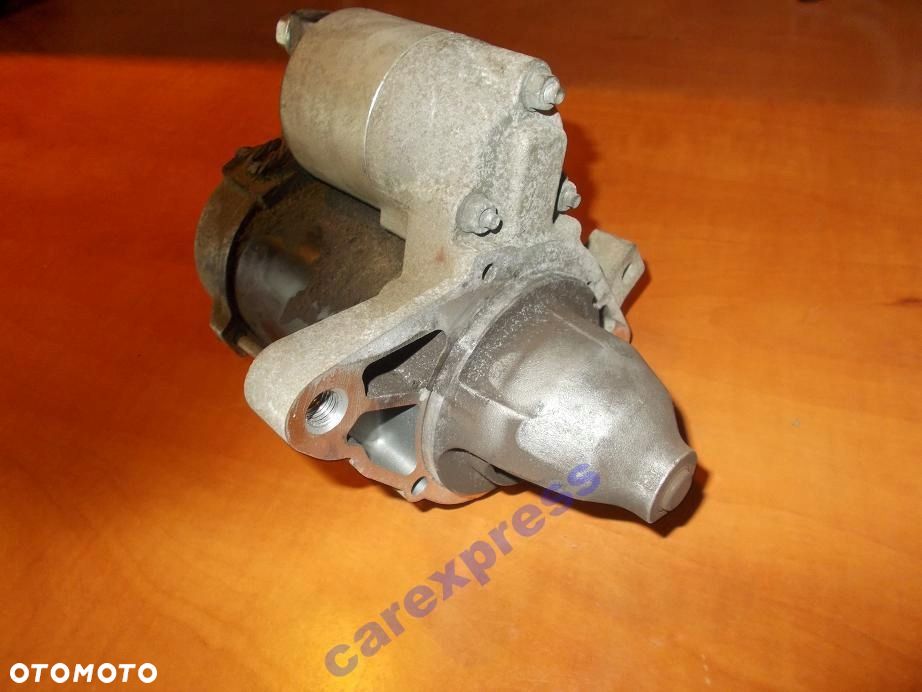 ROZRUSZNIK TOYOTA YARIS II 1.0 KR VVTI 28100-0Q050 - 1