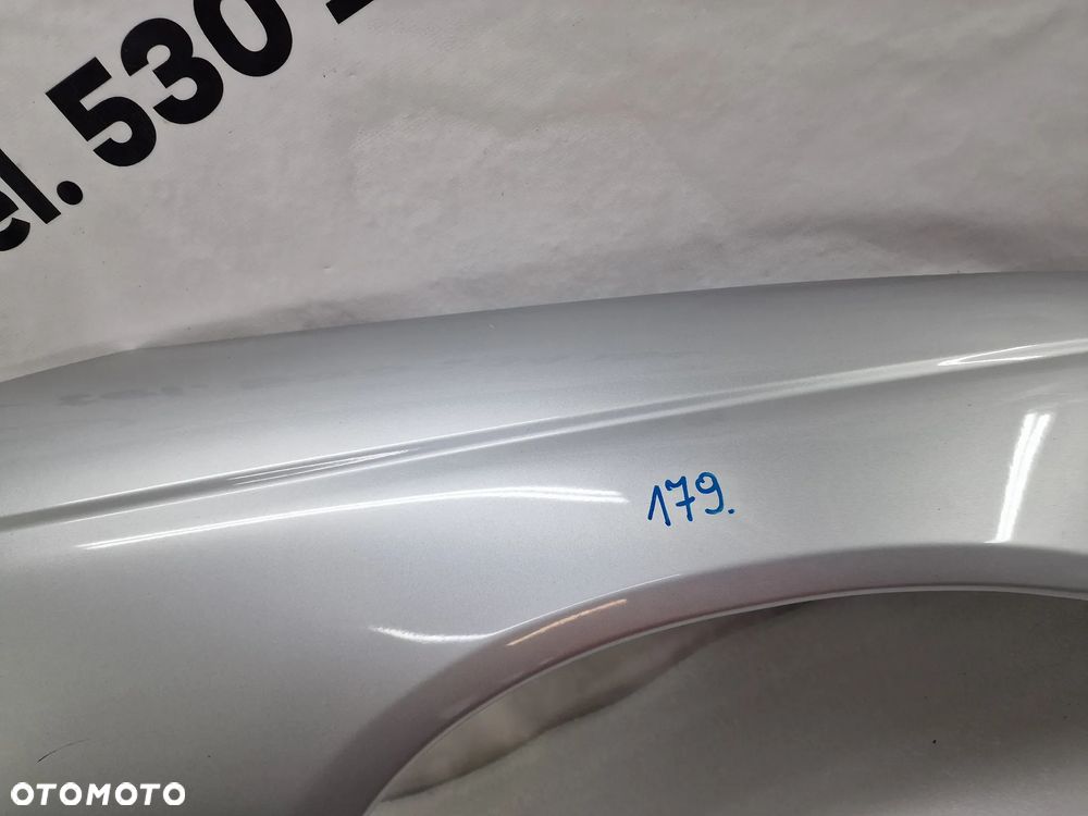 OPEL OMEGA C 99-02 SREBRNY PRAWY BŁOTNIK PRZEDNI PRZÓD , NR AUKCJI BŁ179 - 7