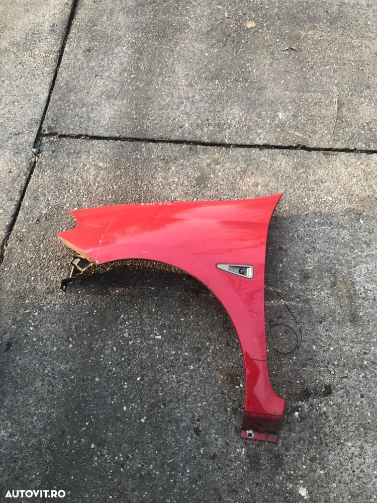 Aripa stanga fata Renault Clio Thalia 2011 rosu - 1