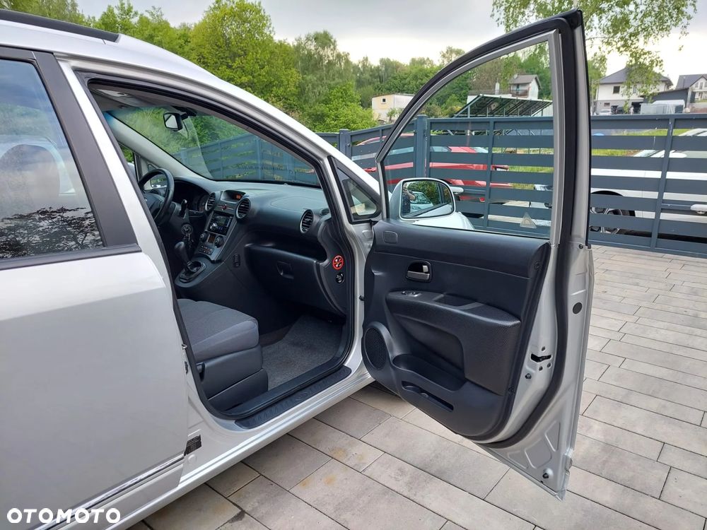 Kia Carens 2.0 CVVT EX - 31