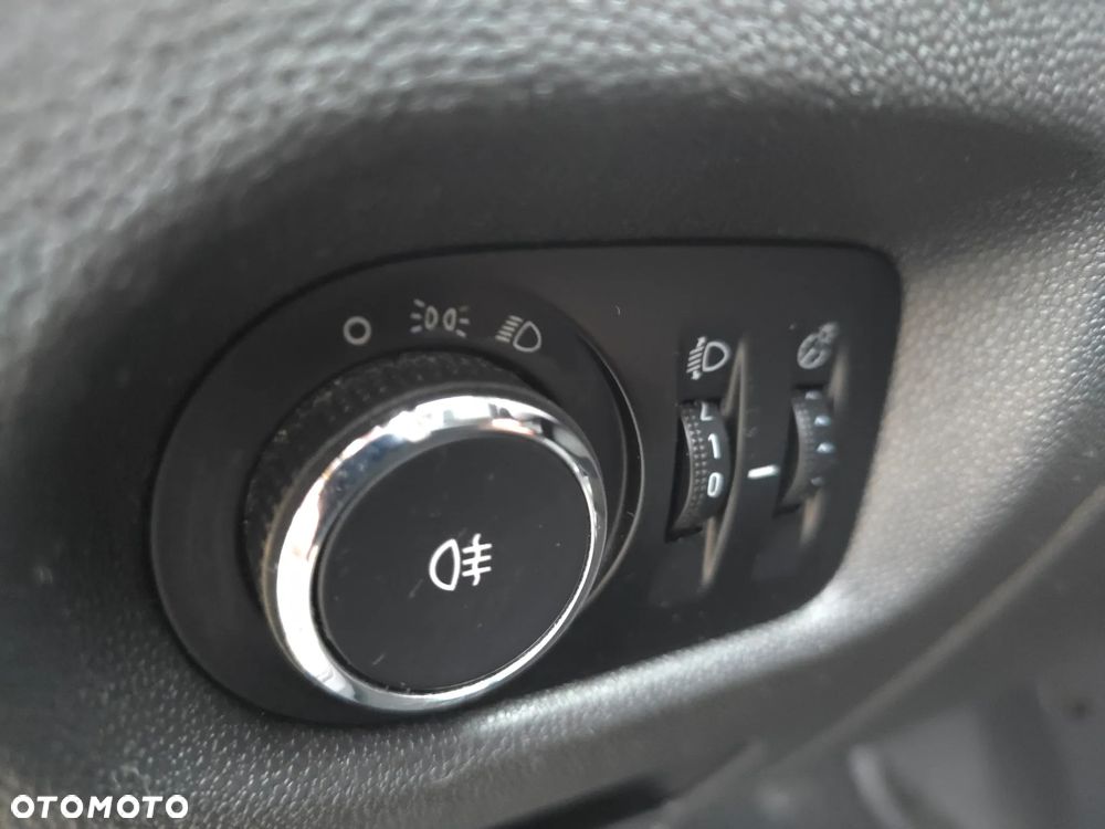 Opel Corsa 1.2 16V Enjoy - 21