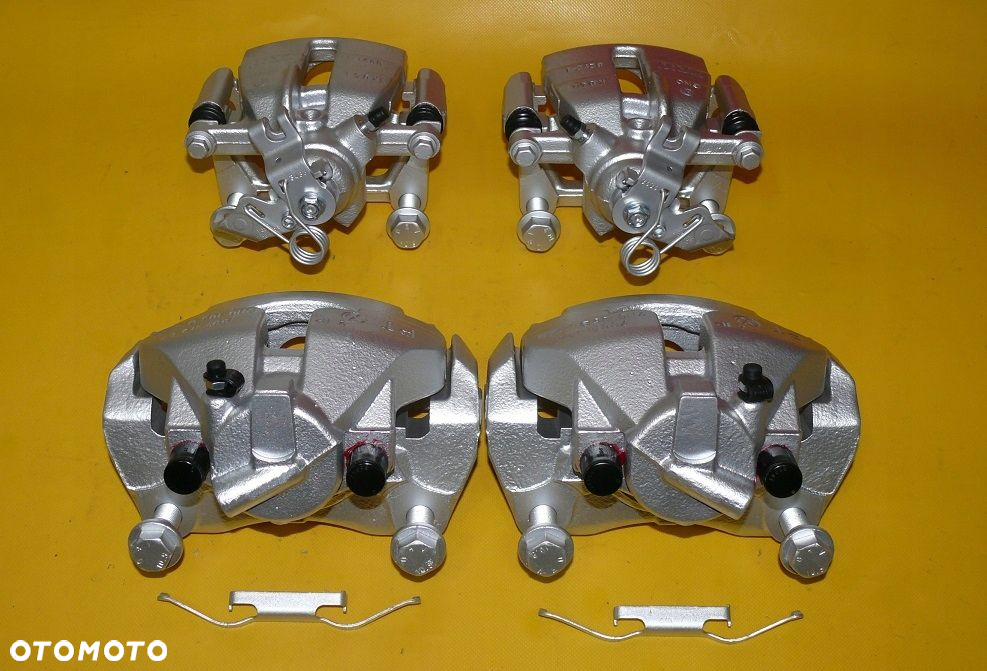 ZACISKI JARZMA LEWY PRAWY PRZÓD TYŁ VW TRANSPORTER T5 308/29,5 294/22mm 03- - 10