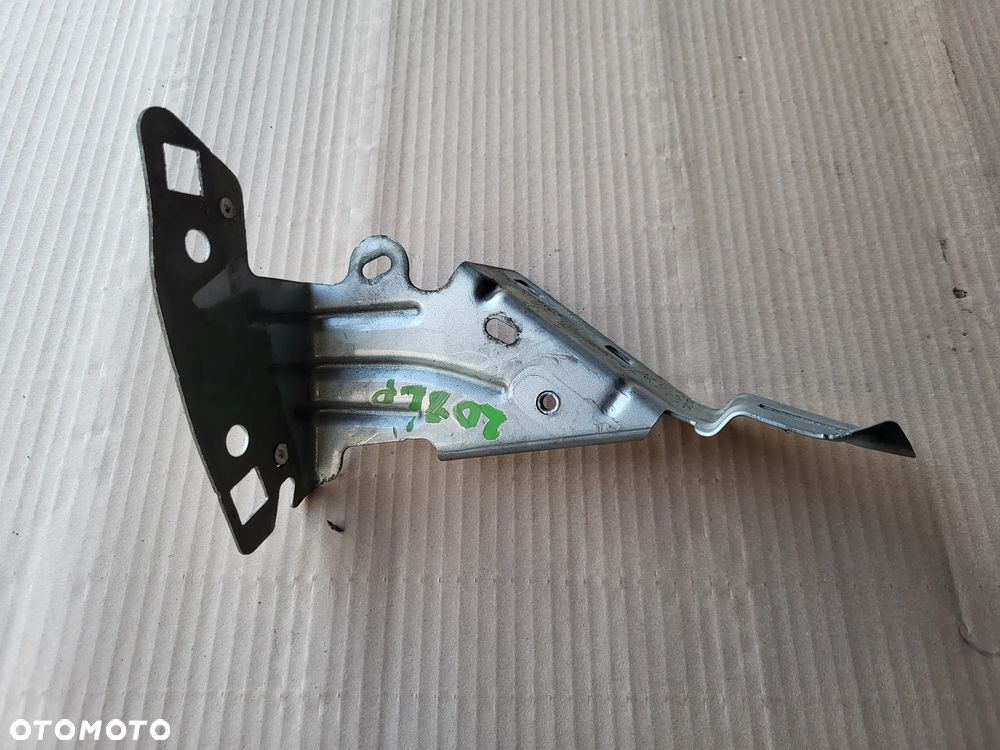 Wspornik mocowanie błotnika lewego przedniego Peugeot 208 I EZR - 1