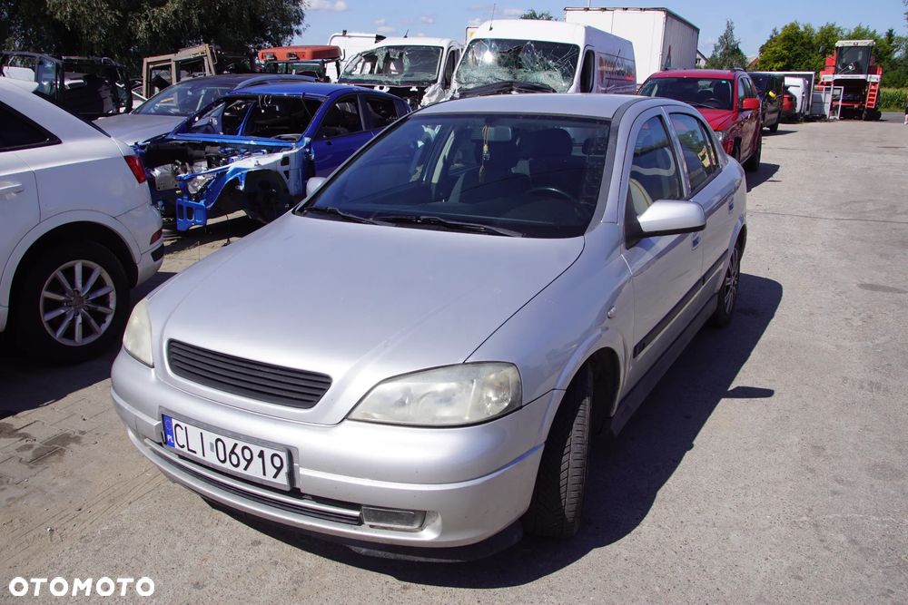 Auto na części - Opel Astra II G 1.6 16V 101 KM Z16XE F17 Z157 2002R Silnik Skrzynia Drzwi Maska Błotnik Zderzak Klapa Lampa Lusterko Klamka Szyba Deska Kokpit Sterownik Moduł Czujnik Licznik Panel Kierownica - 10