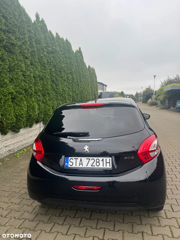 Peugeot 208 2014 photo 4
