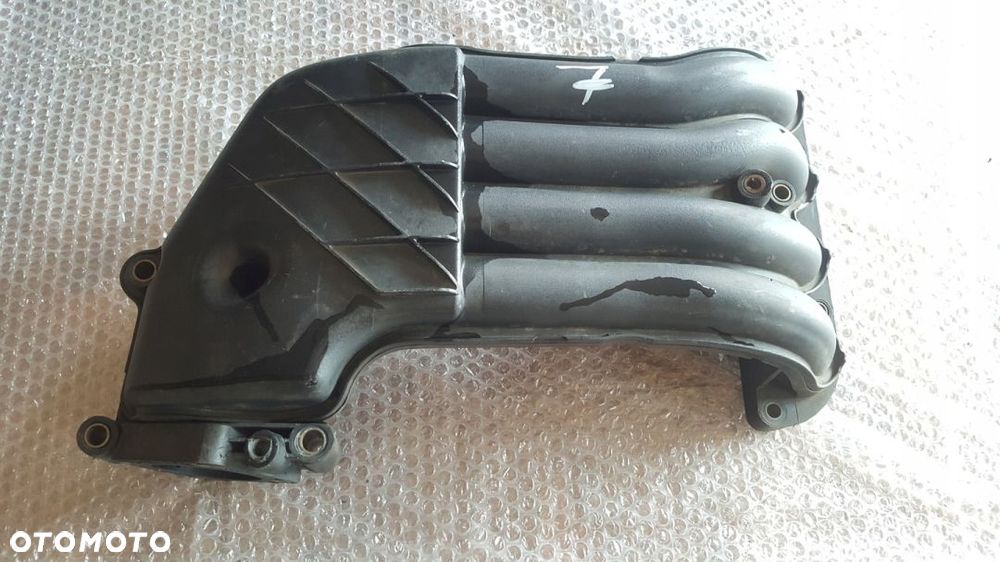 KOLEKTOR SSĄCY 038129713H VW GOLF SKODA LEON