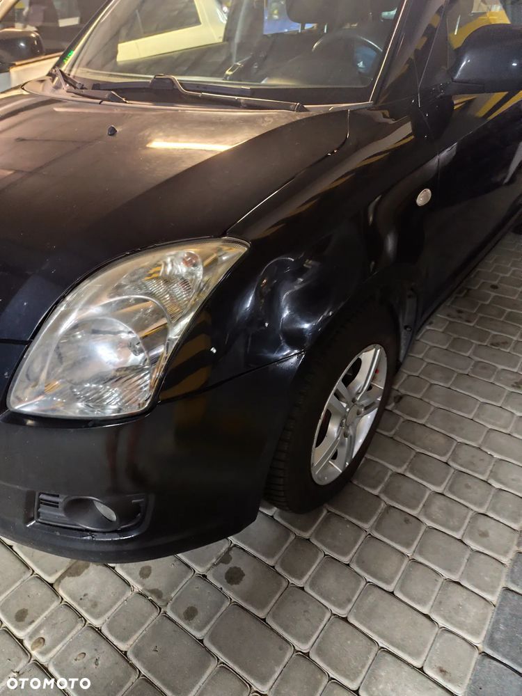 Suzuki Swift 1.3 Comfort - 23