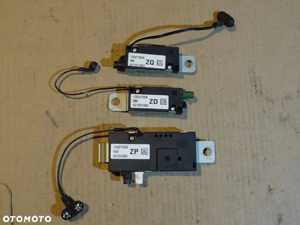 OPEL INSIGNIA ASTRA J ZAFIRA C MOKKA MODUŁ WZMACNIACZ ANTENOWY SYGNAŁU ANTENY GPS - 1