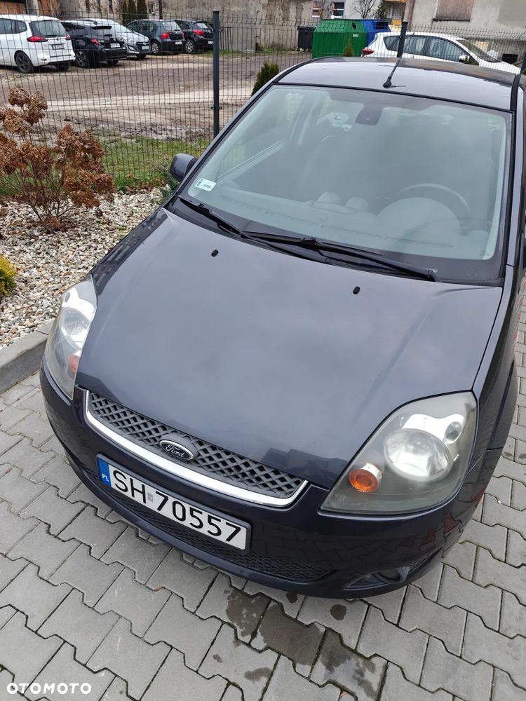 Ford Fiesta 1.4 Ghia - 8