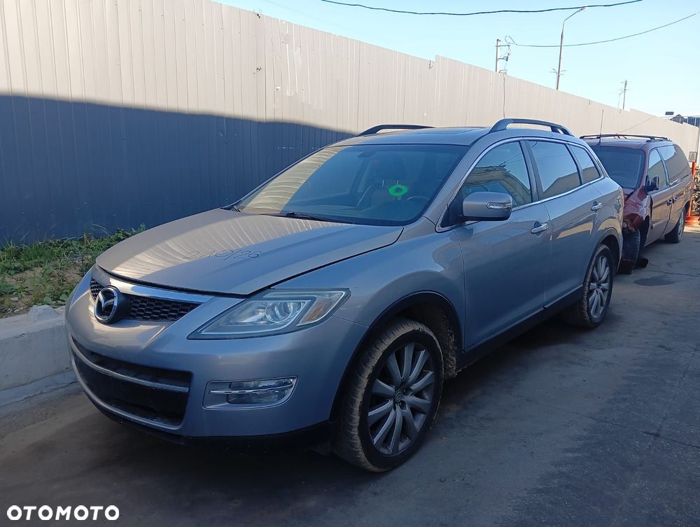 Zderzak (Błotnik, Lusterko, Maska, Drzwi, Lampa, Kierownica) Mazda Cx-9 3.5 Benzyna-Gaz 252 K 2007 r - 1
