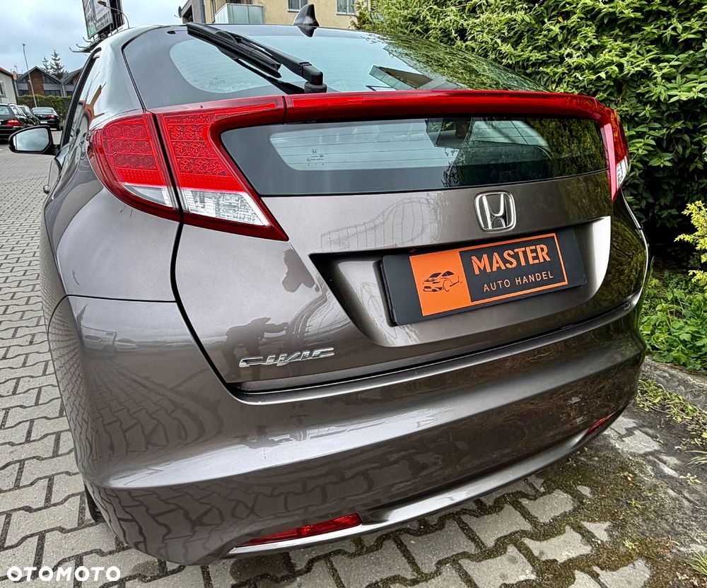 Honda Civic 1.4 i-VTEC Comfort - 11