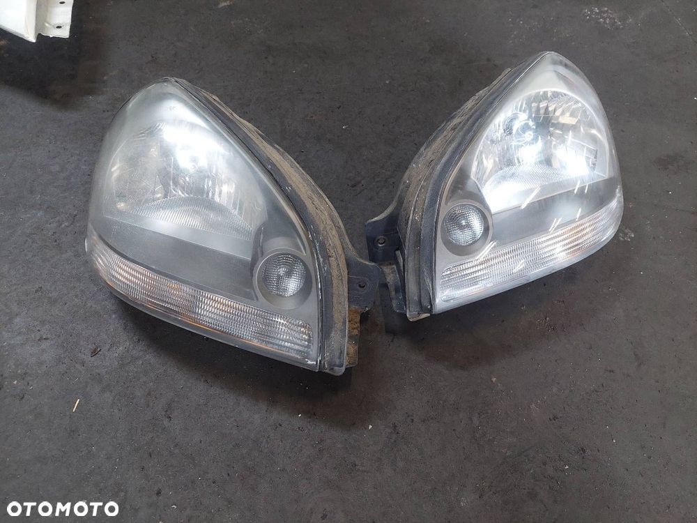 KOMPLETNY PRZÓD MASKA ZDERZAK BŁOTNIKI LAMPY PAS HYUNDAI TUCSON I BW - 2