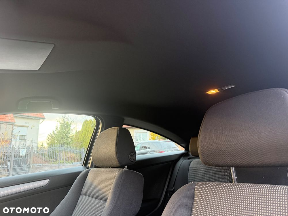 Opel Astra 1.8 Cosmo - 12