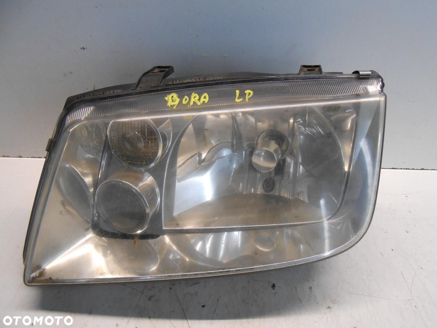 LAMPA LEWA PRZEDNIA PRZÓD VW BORA # - 1