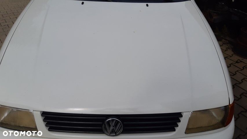 VW Caddy II maska biała - 1